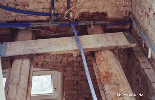 Extensive dry rot damage through water pipe